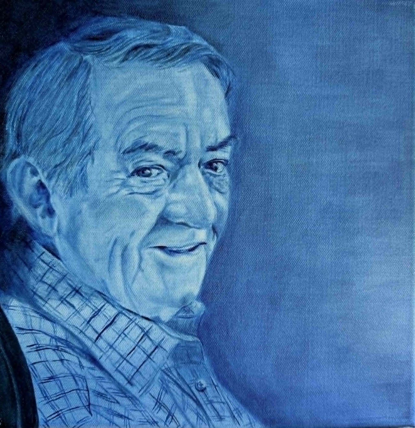 Oil portrait of a man in a plaid shirt, painted as a study in blue monochrome